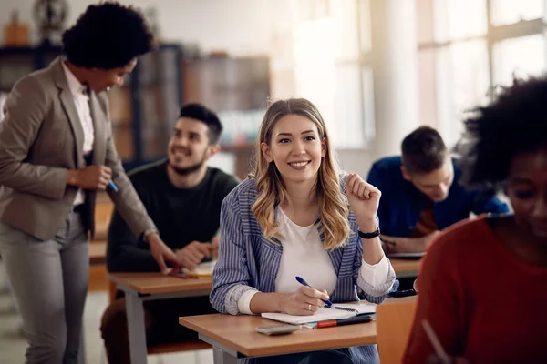 Happy Female University Student Writing Notebook Class Classroom — Stock Fotó