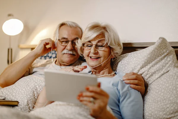 Happy Senior Woman Her Husband Using Digital Tablet While Relaxing — Photo