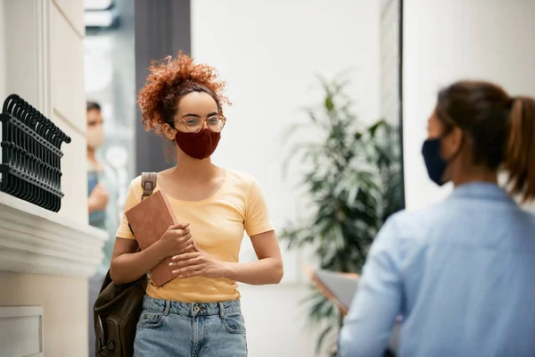 Happy Female Student Protective Face Mask Walking Though University Hallway — 스톡 사진