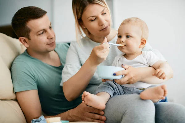 Cute Little Boy Eating Baby Food While Being Fed His — Foto de Stock