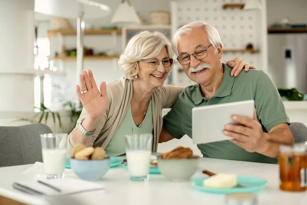 Happy Mature Couple Having Video Call Digital Tablet Waving Someone — Photo