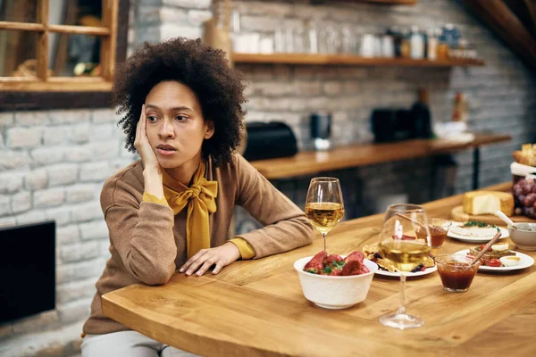 African American Woman Feeling Disappointed While Sitting Alone Waiting Someone —  Fotos de Stock