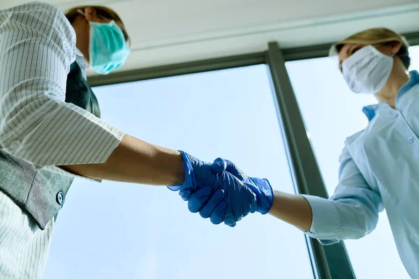 Low Angle View Business Colleagues Wearing Protective Gloves While Shaking — 스톡 사진