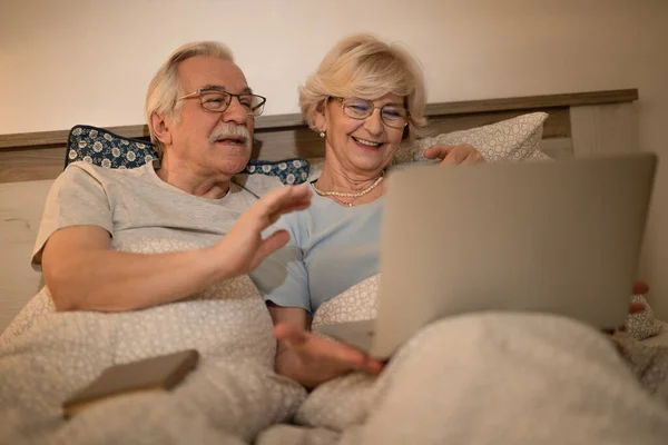 Happy Senior Couple Waving Someone While Making Video Call Laptop — Photo