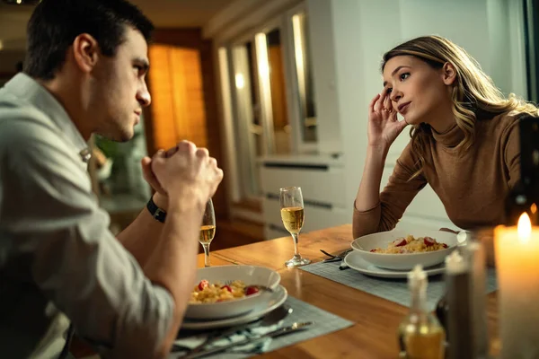 Young Couple Relationship Difficulties Talking While Having Dinner Dining Table — стоковое фото