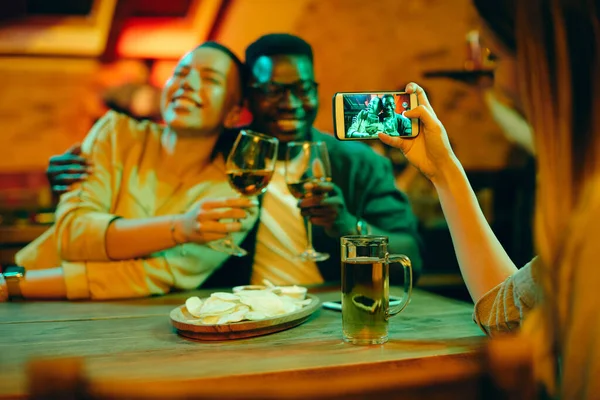 Close Woman Taking Picture African American Couple Night Out Bar — стокове фото