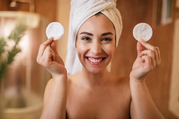 Beautiful Happy Woman Holding Two Cotton Pads While Looking Camera — Φωτογραφία Αρχείου