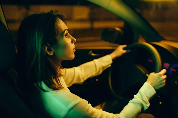 Young Woman Driving Alone Her Car Night — Stockfoto