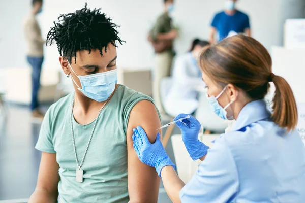 Young African American Man Getting Vaccinated Coronavirus Vaccination Center — 스톡 사진