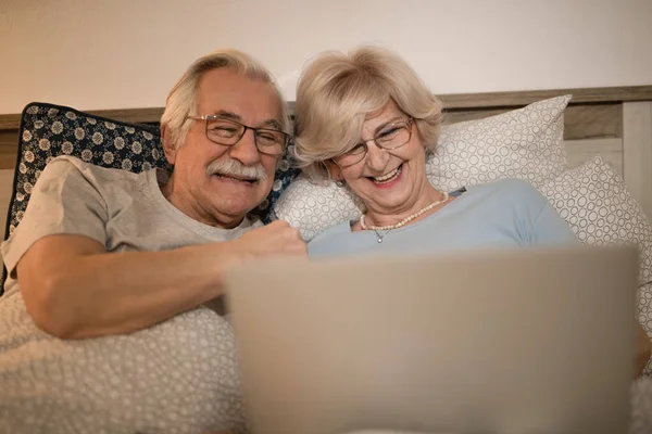 Happy Mature Couple Having Fun While Surfing Net Laptop Bedroom — Photo