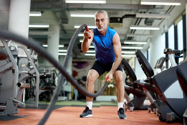 Mature Athlete Exercises Battle Ropes Sports Training — Fotografia de Stock