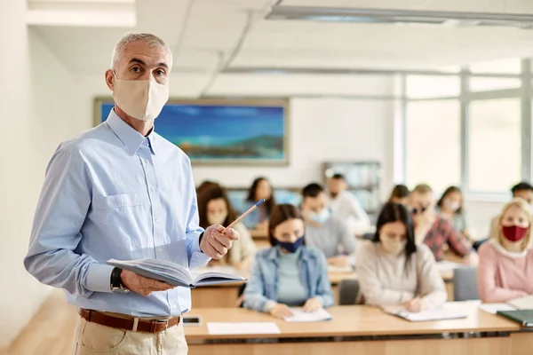 Mature University Professor Wearing Protective Face Mask While Teaching His — Stok Foto