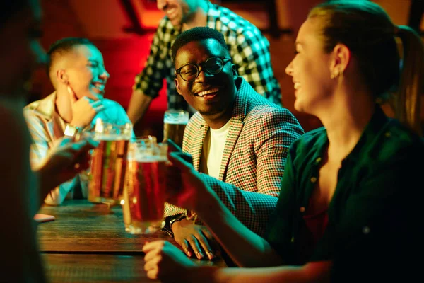 Happy African American Man His Friends Toasting While Drinking Beer — стокове фото