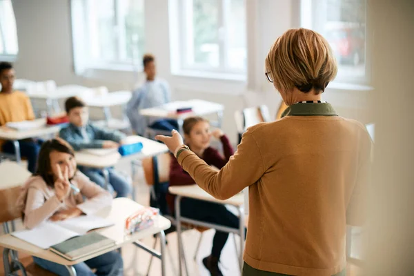Rear View Elementary School Teacher Pointing One Her Students Who — Stockfoto