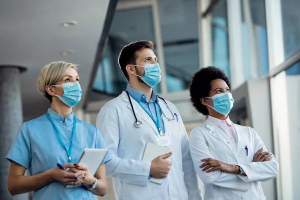 Group Confident Healthcare Workers Wearing Face Masks While Working Medical — 스톡 사진