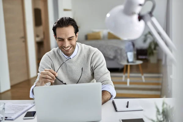 Happy Freelance Worker Using Laptop While Working Home — Stockfoto