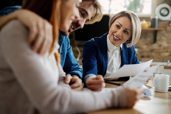 Happy Real Estate Agent Her Clients Going Trough Paperwork Meeting — Foto Stock