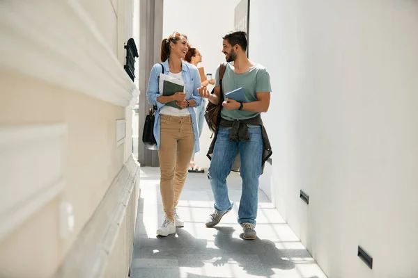 Full Length Happy College Couple Walking Hall Talking Each Other — Stockfoto