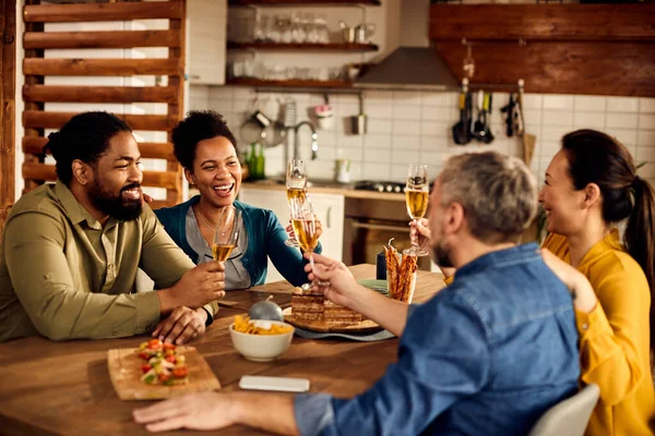 Group Happy Multiracial Friends Toasting Champagne While Gathering Home Focus — Foto de Stock