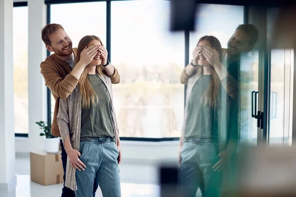 Happy Man Having Fun Covering Girlfriend Eyes While Leading Her —  Fotos de Stock