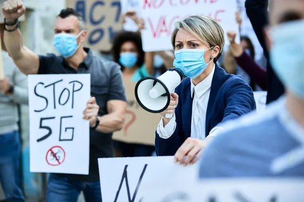 Displeased Businesswoman Shouting Megaphone While Wearing Protective Face Mask Protest — Foto Stock