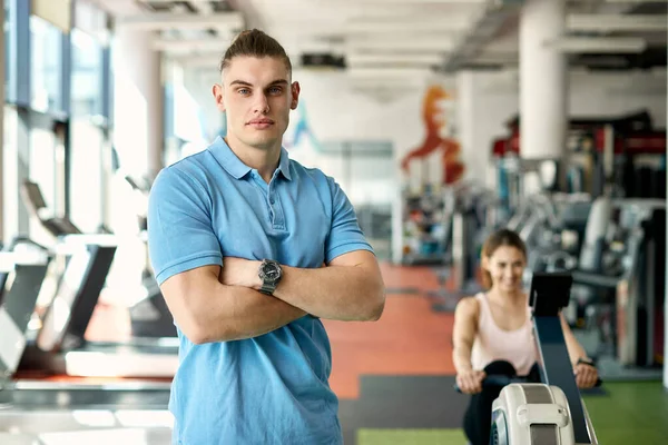 Young Fitness Instructor Standing Arms Crossed Gym While Sportswoman Working — ストック写真