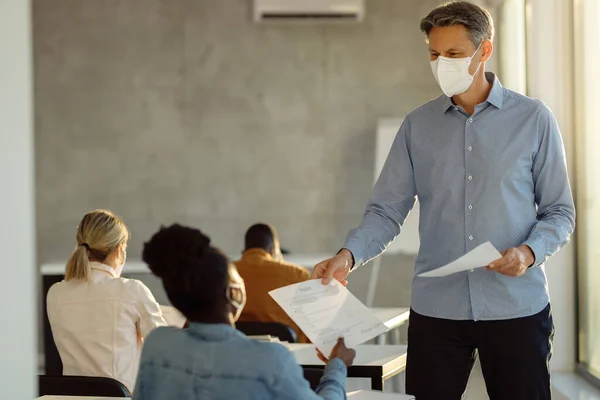 Happy College Teacher Protective Face Mask Giving Test Results His — Stock Photo, Image