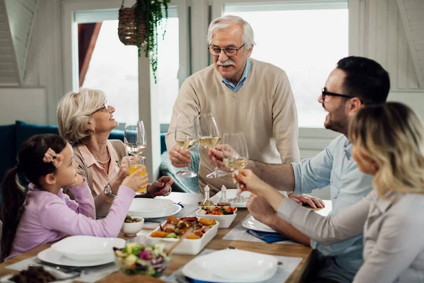 Happy Multi Generation Family Toasting While Having Lunch Together Dining — Foto Stock