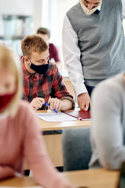 Mature Professor Assisting His Student Lecture Classroom Wearing Face Masks — Stok Foto