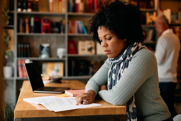 African American Woman Reading Book While Preparing Exam Learning Library — Stockfoto