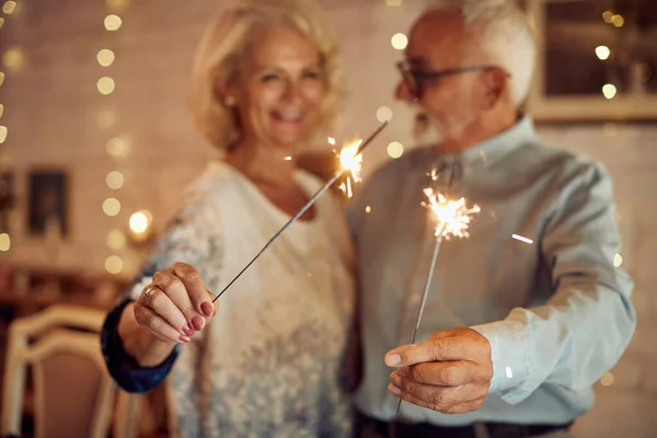 Close Senior Couple Celebrating Christmas Having Fun Sparklers — ストック写真