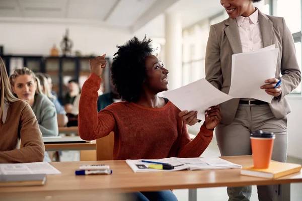 Happy Black Student Celebrating Getting Good Grade Test She Received —  Fotos de Stock