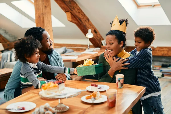 Happy African American Woman Having Fun While Family Surprising Her — Foto de Stock