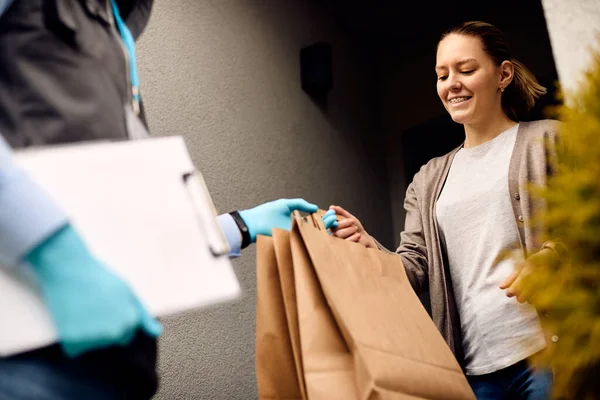 Low Angle View Smiling Woman Receiving Home Delivery Taking Bags — Stockfoto