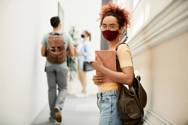 Portrait Female Student Protective Face Mask Standing University Hallway Looking — Foto Stock