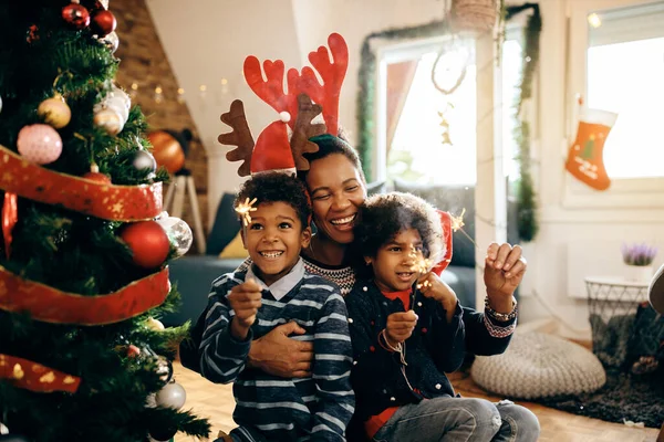 Cheerful African American Mother Her Kids Using Sparklers Having Fun — Foto de Stock