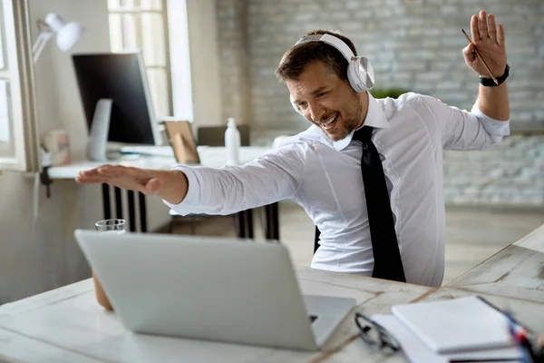 Happy Businessman Listening Music Headphones Having Fun While Working Computer — Stock Fotó