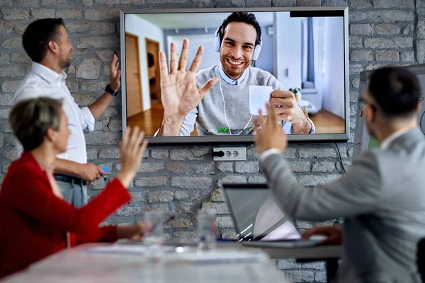 Happy Businessman Greeting His Colleagues While Having Video Conference Office — Fotografia de Stock