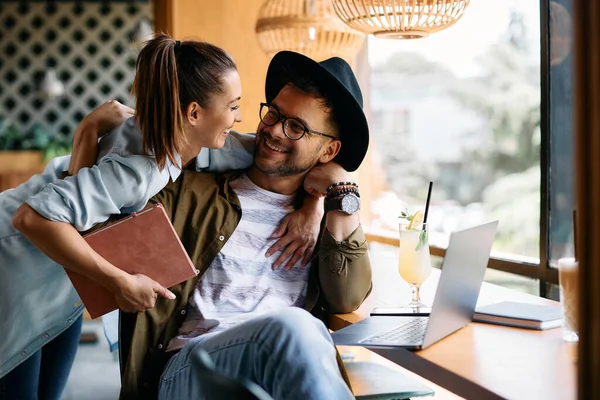 Young Happy Students Embracing While Communicating Studying Together Cafe — Stockfoto