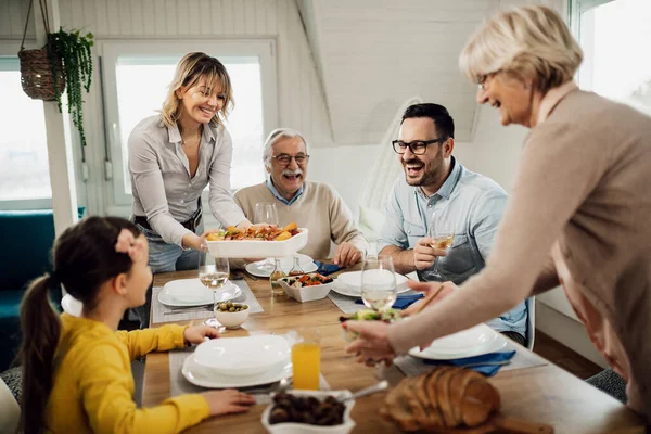 Happy Extended Family Having Fun Lunch Time Dining Room Women — Zdjęcie stockowe