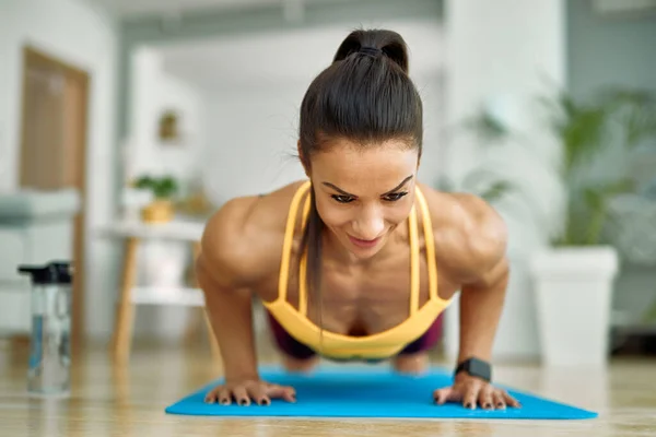 Smiling Muscular Build Woman Plank Pose Exercising Home — Foto de Stock