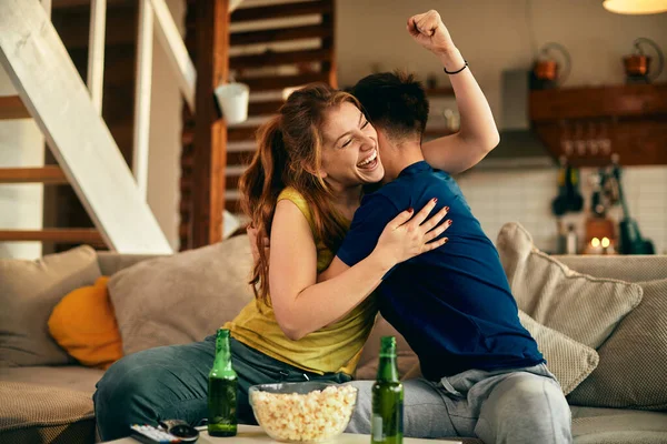 Happy Couple Embracing Celebrating Victory Sports Team While Watching Match — Stock Fotó