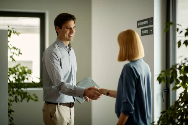 Happy Coworkers Shaking Hands While Meeting Hallway Office Building Focus — Photo