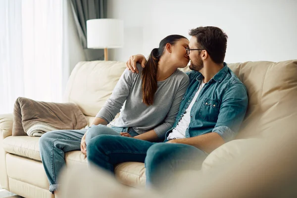 Couple Love Embracing Kissing While Sitting Sofa Living Room — Stock Fotó