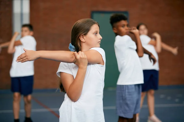 Group Elementary Students Warming Physical Education School Gym Focus Girl — Foto de Stock