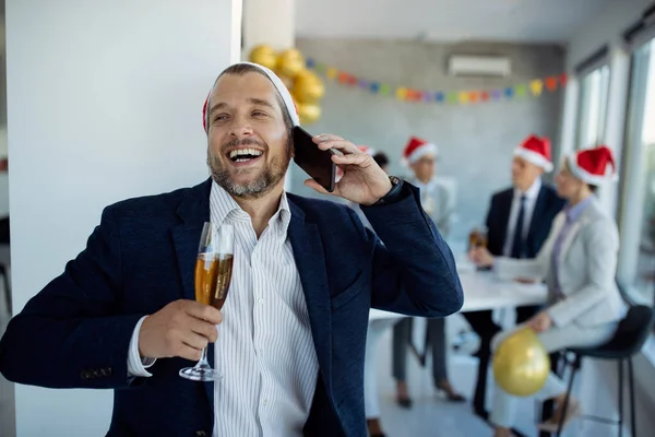 Mid Adult Businessman Having Fun While Drinking Champagne Communicating Mobile — стокове фото