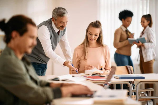 Happy Professor Assisting His Female Student Lecture Class Classroom — Stock Fotó