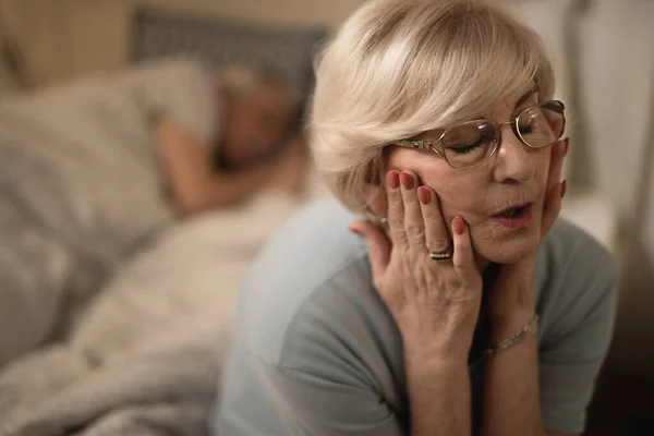 Distraught Senior Woman Sitting Eyes Closed Bedroom Night — Stock Photo, Image