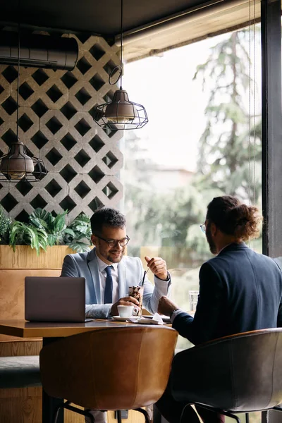 Young Happy Businessman Drinking Coffee While Being His Coworker Cafe —  Fotos de Stock