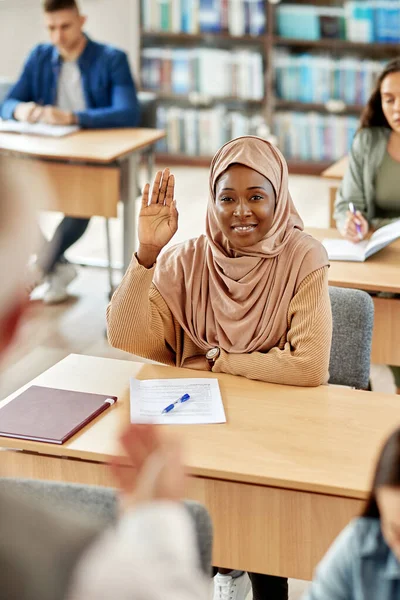 Happy Muslim Student Raising Her Arm Ask Question Class University — Fotografia de Stock